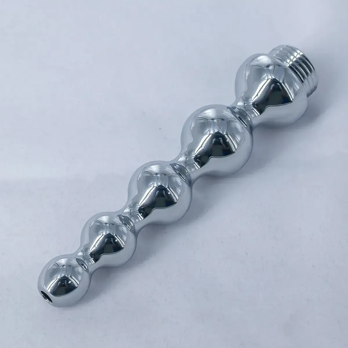 jeringa anal metalica para limpieza intima