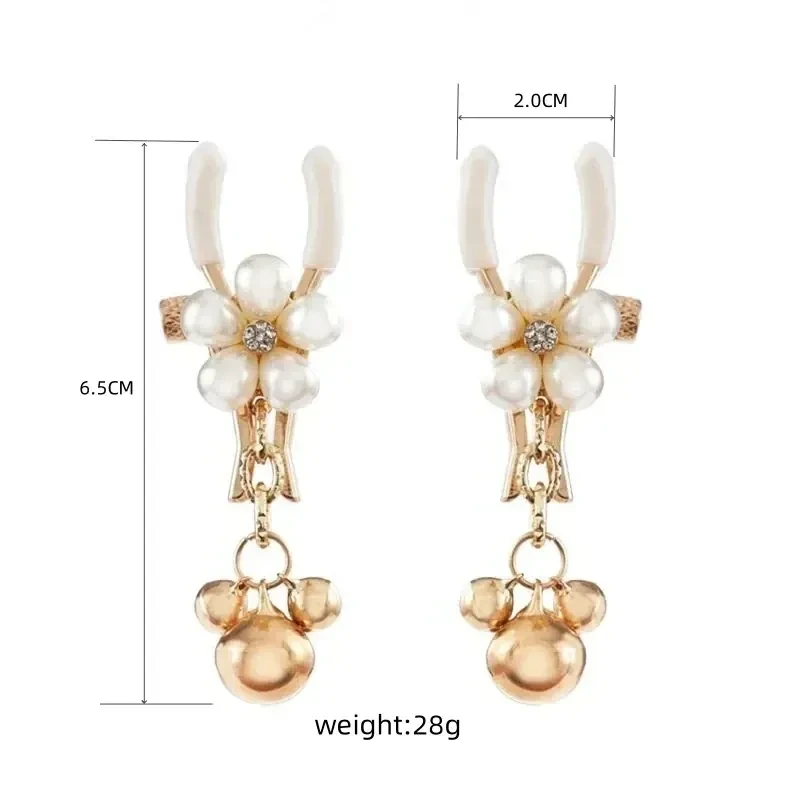 pinzas ajustables con detalle de perlas