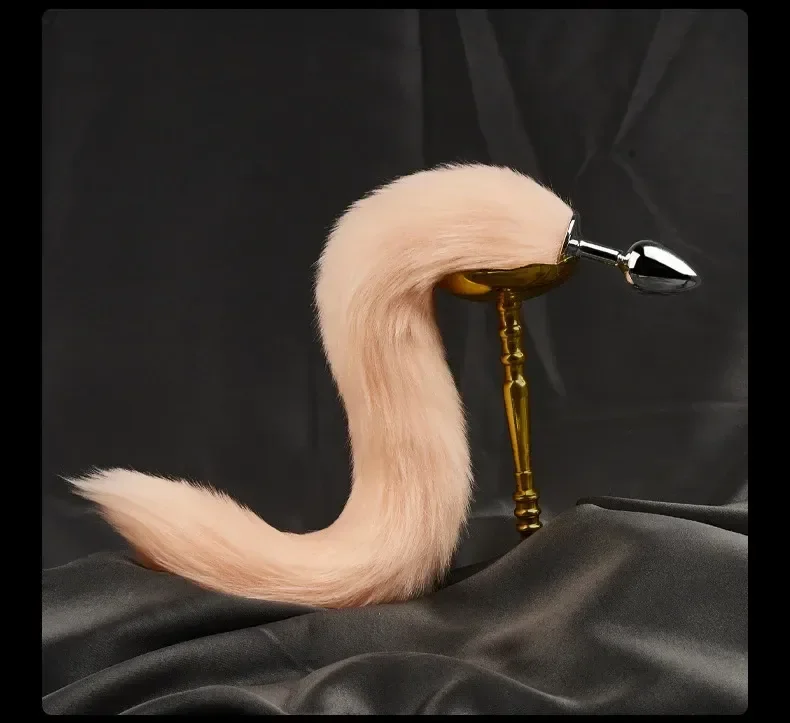 tapon anal de acero con cola peluda