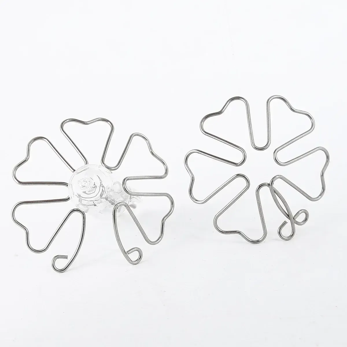 abrazaderas pezones metalicas forma flor