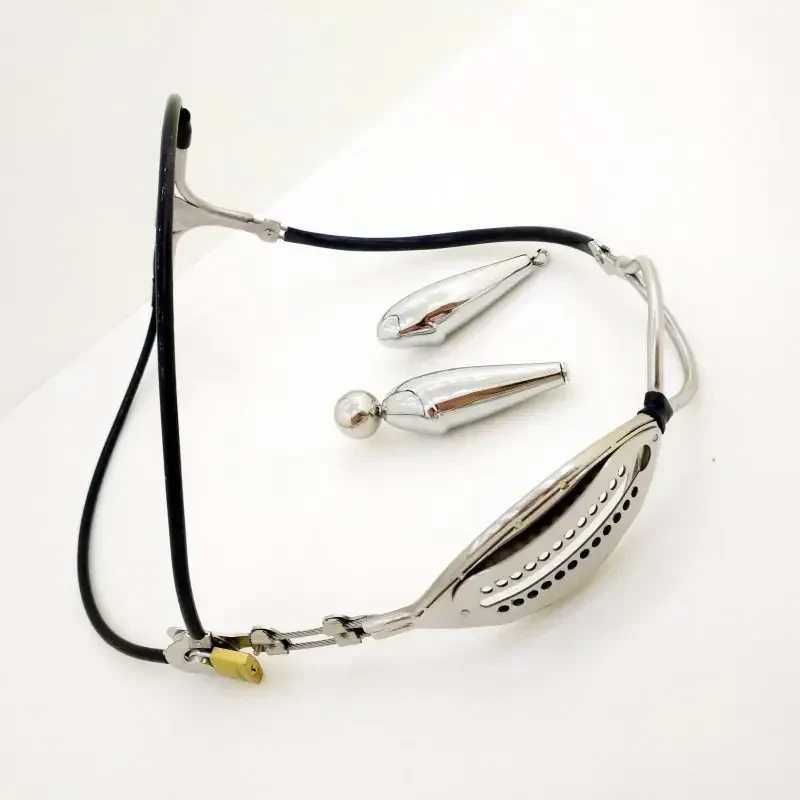 arnes castidad metalico con plug anal